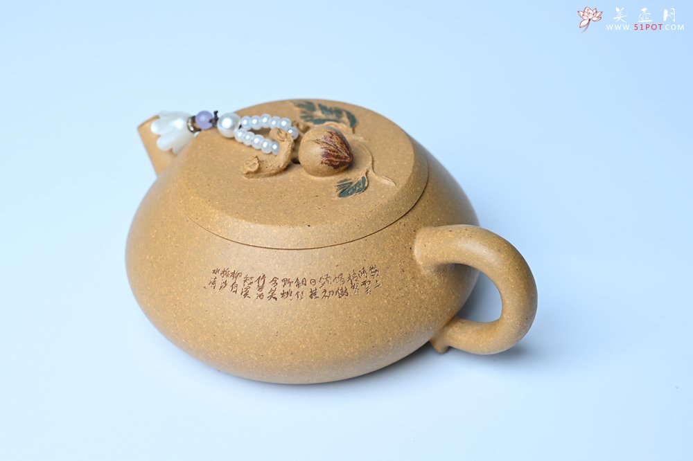 紫砂壶图片：美壶特惠 特好黄龙山段泥香桃壶 桃和叶特灵动 仿生佳作 - 紫砂壶信息网